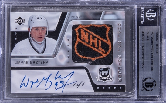 2006-07 UD The Cup "Dual NHL Shields Autographed" #DASGL Wayne Gretzky/Mario Lemieux Dual Signed NHL Shield Game Used Patch Card (#1/1) – BGS Authentic